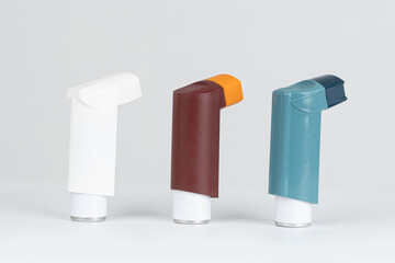 Ashtma inhaler isolated on white background.