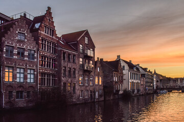 Fototapeta na wymiar Canal houses in Ghent, Belgium during sunset