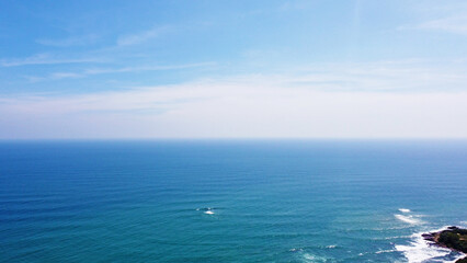 Obraz premium Aerial view of the sea background. Beautiful ocean surface pattern for design and advertising