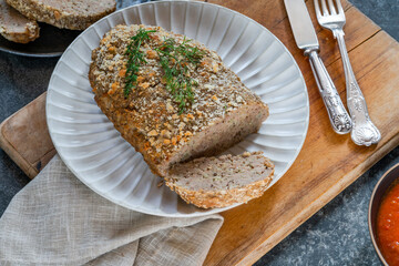 Homemade pork meatloaf with tomato sauce
