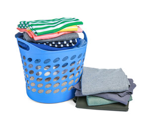 Plastic laundry basket and clean clothes isolated on white