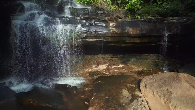 untouched primeval forest nature jungle Waterfall. Nice aerial view flight drone