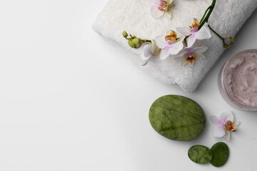 Flat lay composition with different spa products on white background. Space for text