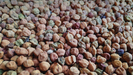 Close up click of raw sun-dried brown chickpeas (chana)