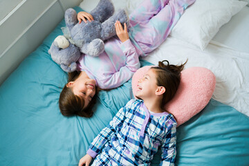 Adorable little girls in their happy slumber party