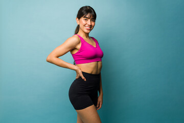 Fototapeta na wymiar Hispanic beautiful strong woman with an athletic body