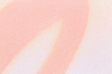 Fototapeta premium Macro close-up of beige spray paint with splashes on a white wall. Abstract full frame textured splattered graffiti background with copy space.
