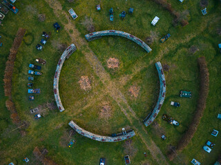 An aerial view of the natural cemetery is defined by stone walls and hornbeam walls, which are shaped like a circle.
