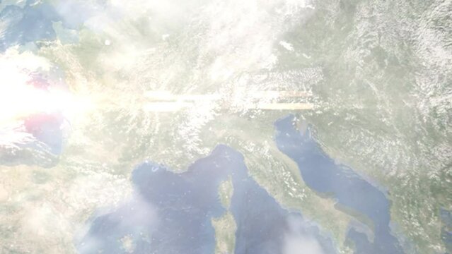 Earth zoom in from outer space to city. Zooming on Pavia, Italy. The animation continues by zoom out through clouds and atmosphere into space. Images from NASA