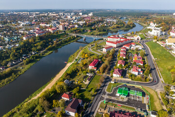 Obraz premium aerial view of huge bridge between two banks and urban areas