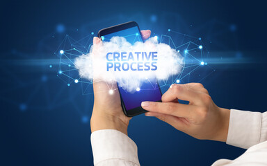 Hand using smartphone with cloud business concept