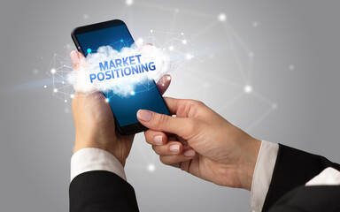 Hand using smartphone with cloud business concept