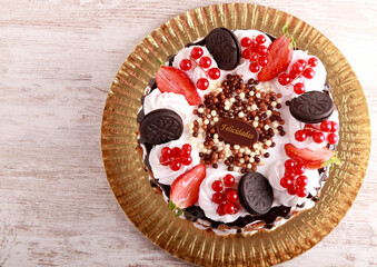 Chocolate layered cake with fruit