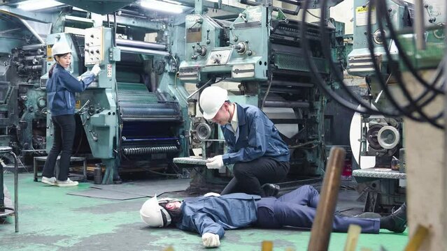 労働災害に対応する作業員