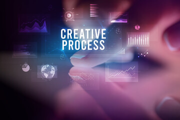 Finger touching tablet with business graphs and icons concept