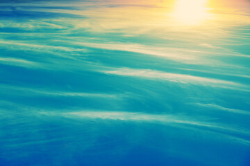 Colorful cloudy sky at sunset. Gradient color. Sky texture, abstract nature background