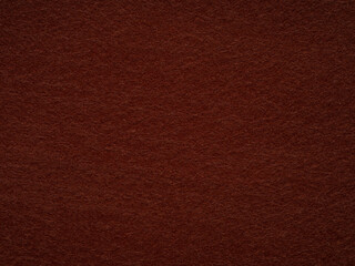 Brown felt fabric material texture. Full frame large matt backdrop wallpaper. Matt retro velvet...
