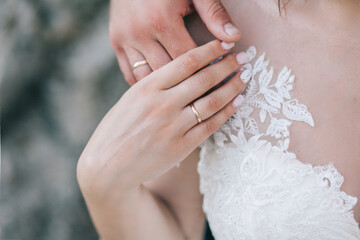 Wedding rings on the hands
