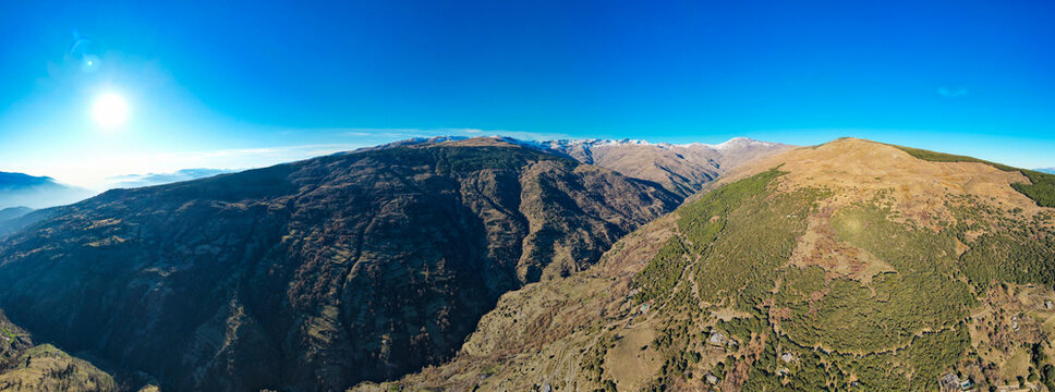 Aerial view above the beautiful village of Capileira in the gorge of the Poqueira in Andalusia Spain