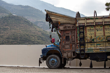 Colorful traditional Pakistani truck in Rawalpindi, Pakistan - obrazy, fototapety, plakaty