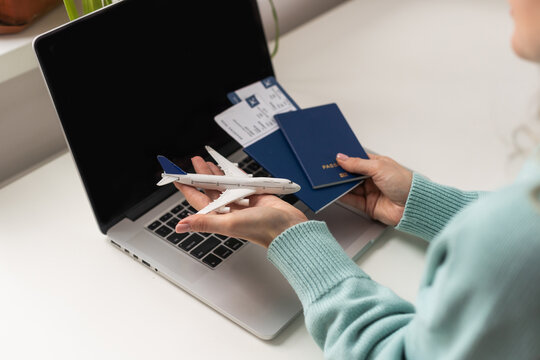 Travel, vacation concept. Top view image of keyboard, passport and toy plane with copy space