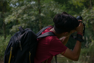 Young Indian Photographer With His Professional Dslr Camera. Photographer And Camera Image.