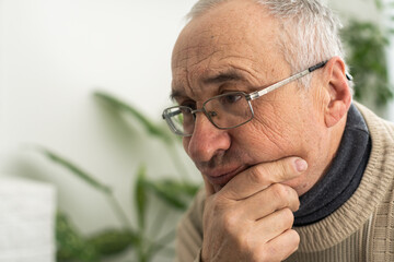 Portrait elderly man on gray background