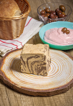 chocolate Greek halva with some fasting food like taramosalata,  bread and olives