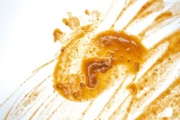 Food stain splash isolated on a white background. Top view, flat lay.