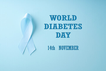 World diabetes day, cancer concept with ribbon on blue background