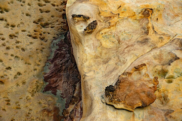 Natural rock texture background on the Santa Cruz beach in the center of Portugal