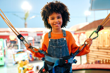 Kids having fun on a carnival Carousel