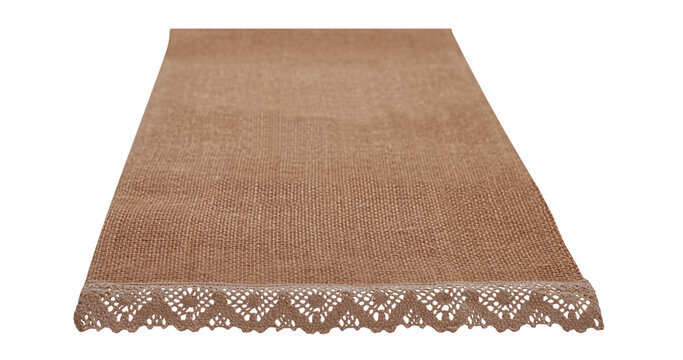 Canvas napkin with lace, natural burlap runner perspective isolated on white. Can used for display or montage product. Selective fokus