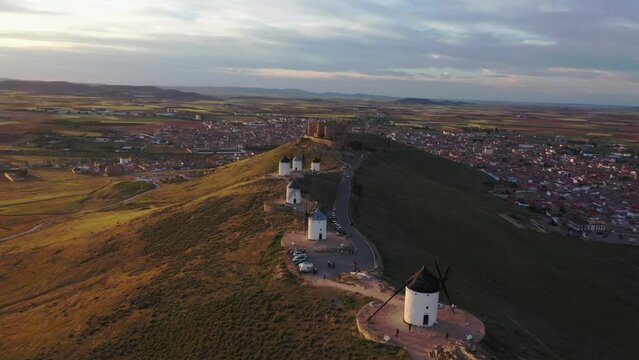 The iconic windmills at Consuegra, Spain, after sunset,