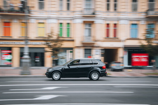 Ukraine, Kyiv - 2 August 2021: Black BMW X5 car moving on the street. Editorial
