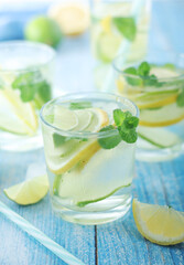 Glasses with lemon and lime lemonade
