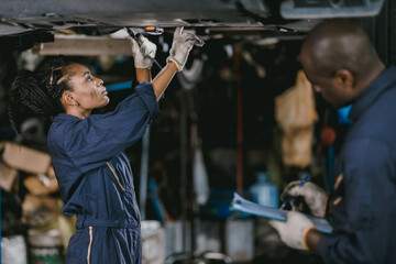 Garage mechanic woman team working car auto service black african people professional worker...