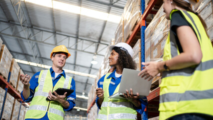 Professional Caucasian manager engineer in safety uniform is training industry factory worker, warehouse  operator engineering team production in heavy industrial manufacture factory.