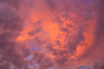 Pink purple sky background with white clouds
