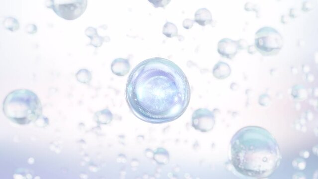 A macro photo of many water bubbles rising against a light blue background. Design for moisturizing bubble blobs in beauty gloss in ultra-slow motion. 3D cosmetic serum animation