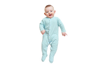 Happy baby lies in mint color clothes, isolated on a white background. Smiling child in turquoise pajamas, top view. Kid aged six months