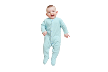 Happy baby lies in mint color clothes, isolated on a white background. Smiling child in turquoise pajamas, top view. Kid aged six months