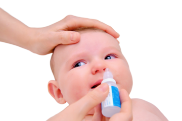 Mother instills nasal drops in Infant baby, face close-up, isolated on a white background. Kid aged four months