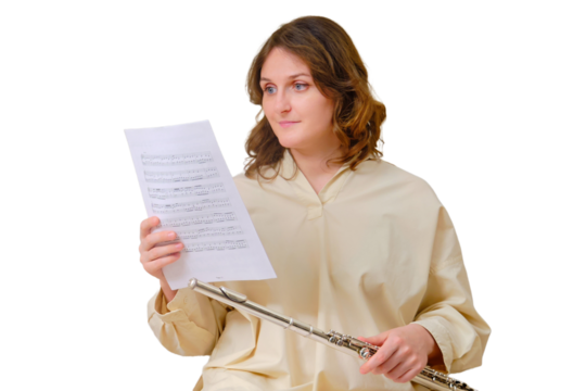 Woman musician with flute looks at notes on sofa in living room, isolated on a white background