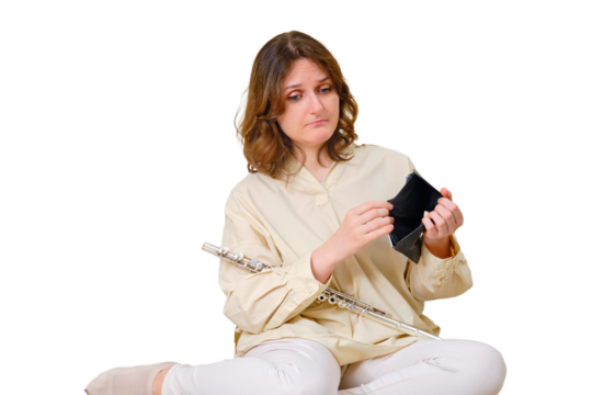 Woman musician with empty wallet no money at home on sofa in living room, isolated on a white background