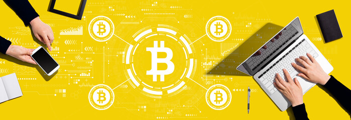 Bitcoin theme with two people working together