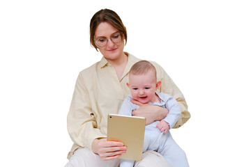 Happy woman mother with infant baby watching in digital tablet while sitting on home sofa in living room, isolated on a white background. Kid aged six months