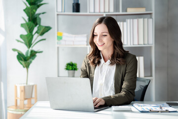 Beautiful woman running a company, a businesswoman who founded a new generation of startup companies, with management run by female leaders, female bosses. Business administration concept.