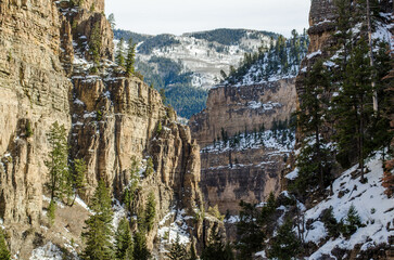 Fototapeta na wymiar Snowy Steep cliffs of Glenwood Canyon, Colorado, USA.