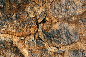 Old worn stone wall surface as background